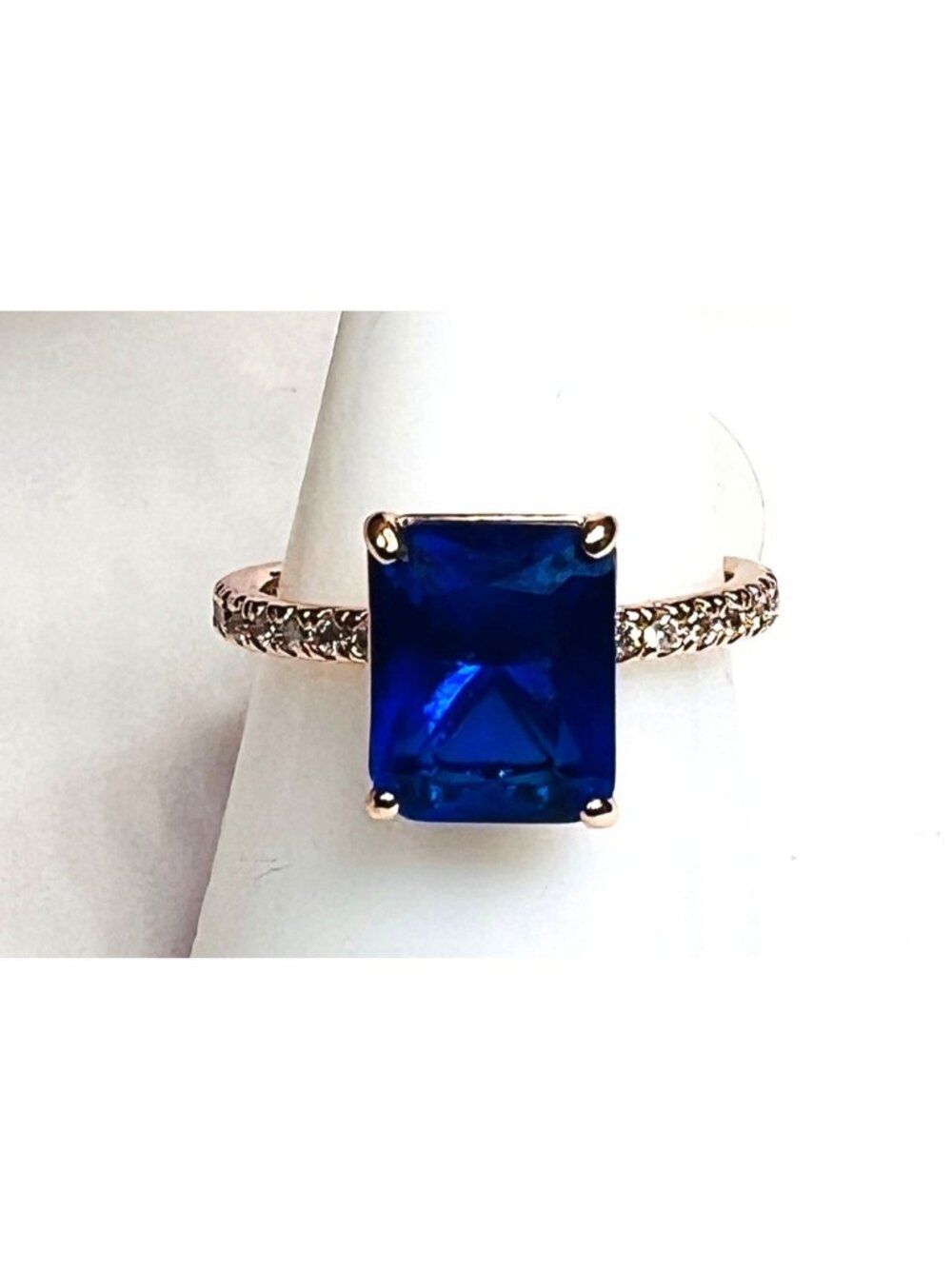 Ring Bomb Party Ring size 7 deep blue stone rose gold color band